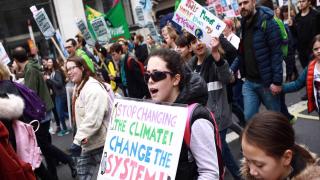 Young people march up Regent Street during the third climate 'youth strike' in London, England, on April 12, 2019. The event was organised as part of the burgeoning global movement of schoolchildren walking out of classes to call political attention to the dangers of climate change. February saw the first such mass 'strike' take over Parliament Square, with a second held last month. The now-worldwide demonstrations began with the lone protests of Swedish teenager Greta Thunberg outside the Swedish parliament last year. (Photo by David Cliff/NurPhoto via Getty Images)
