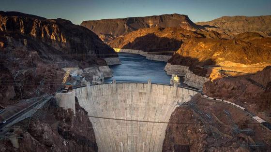 This April 13, 2014 view shows Hoover Dam, a concrete arch-gravity dam in the Black Canyon of the Colorado River on the border between the US states of Arizona and Nevada. Hoover Dam ,finished in 1936, impounds Lake Mead, the largest reservoir in the United States by volume. The dam's generators provide power for public and private utilities in Nevada, Arizona, and California. Hoover Dam is a major tourist attraction; nearly a million people tour the dam each year. AFP PHOTO/JOE KLAMAR (Photo credit should read JOE KLAMAR/AFP via Getty Images)
