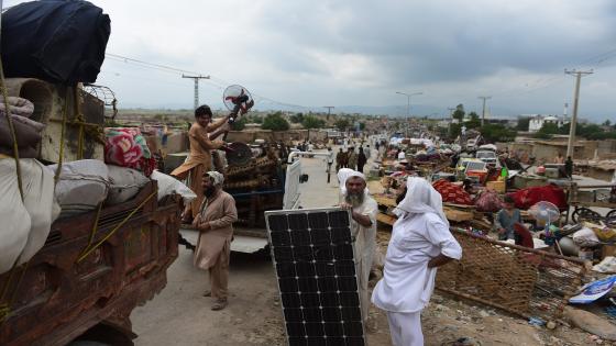 To go with AFP story 'Pakistan-housing-urban-planning-social' by Issam AHMED
In this photograph taken on July 31, 2015, Afghan refugees and Pakistani tribal people shift their belongings during an operation to demolish their poverty-stricken neighbourhood in Islamabad. With no water supply, electricity or sewage, the 2,000 homes that formed the "Afghan Basti" slum in Islamabad have long stood in stark contrast to the rest of Pakistan's green and largely pristine capital. Situated on the edge of the city, the neighbourhood is now at the heart of a battle over housing rights for the poor versus a drive by city authorities to get rid of "illegal" settlements. AFP PHOTO / Farooq NAEEM (Photo credit should read FAROOQ NAEEM/AFP/Getty Images)